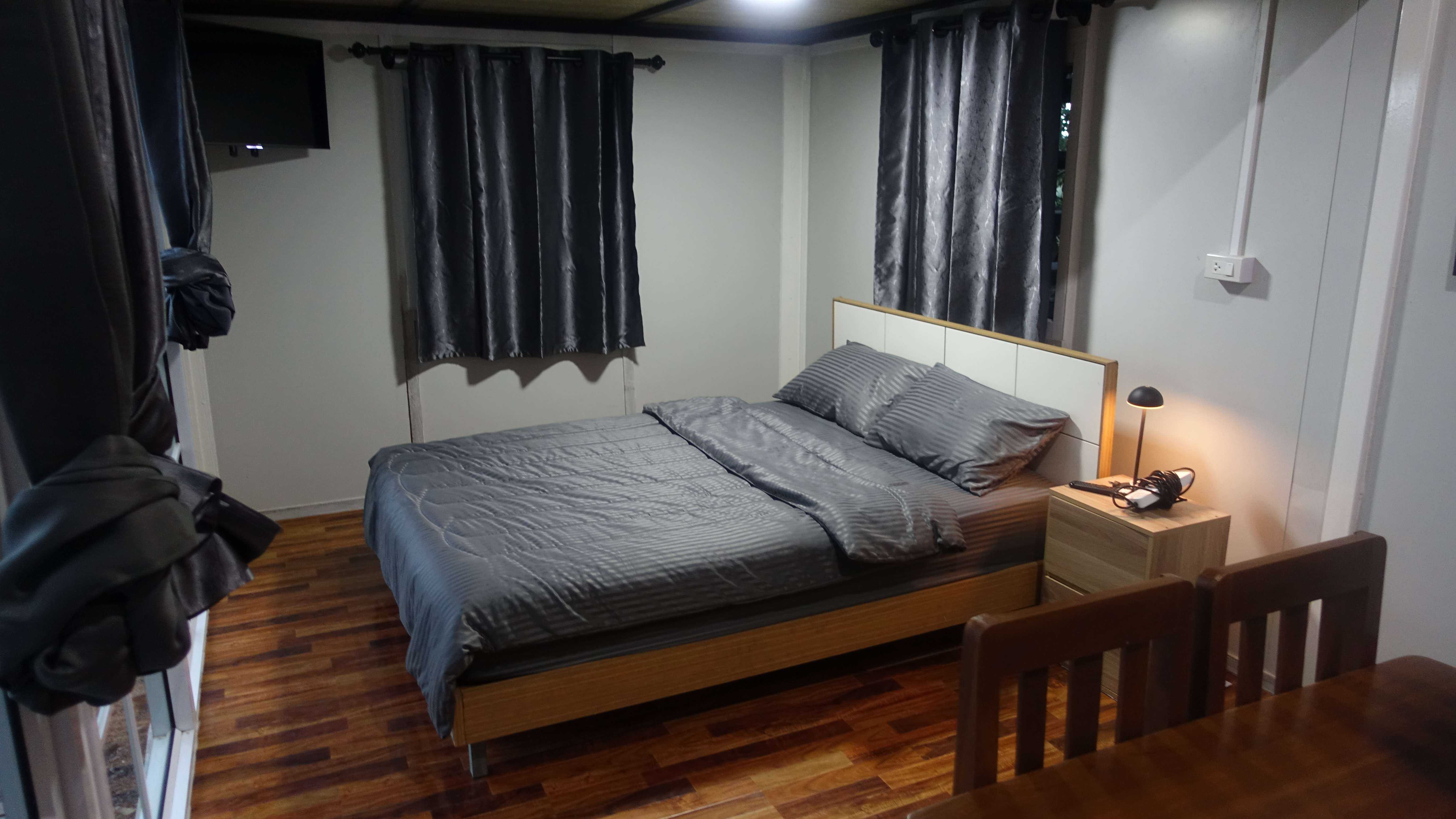 Modern deluxe bungalow interior with laminate floors and contemporary furnishings