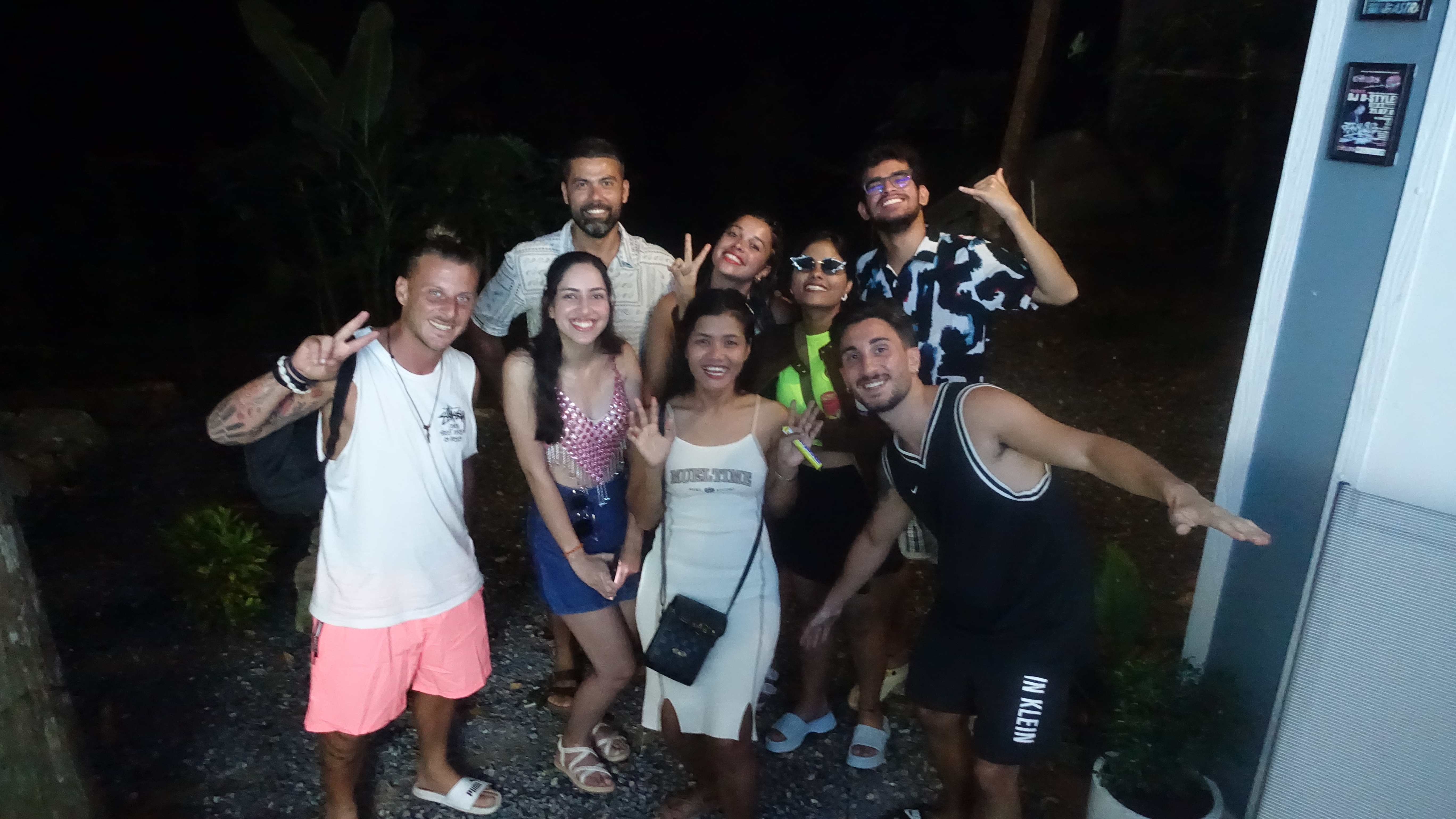 Happy guests posing together for a group photo