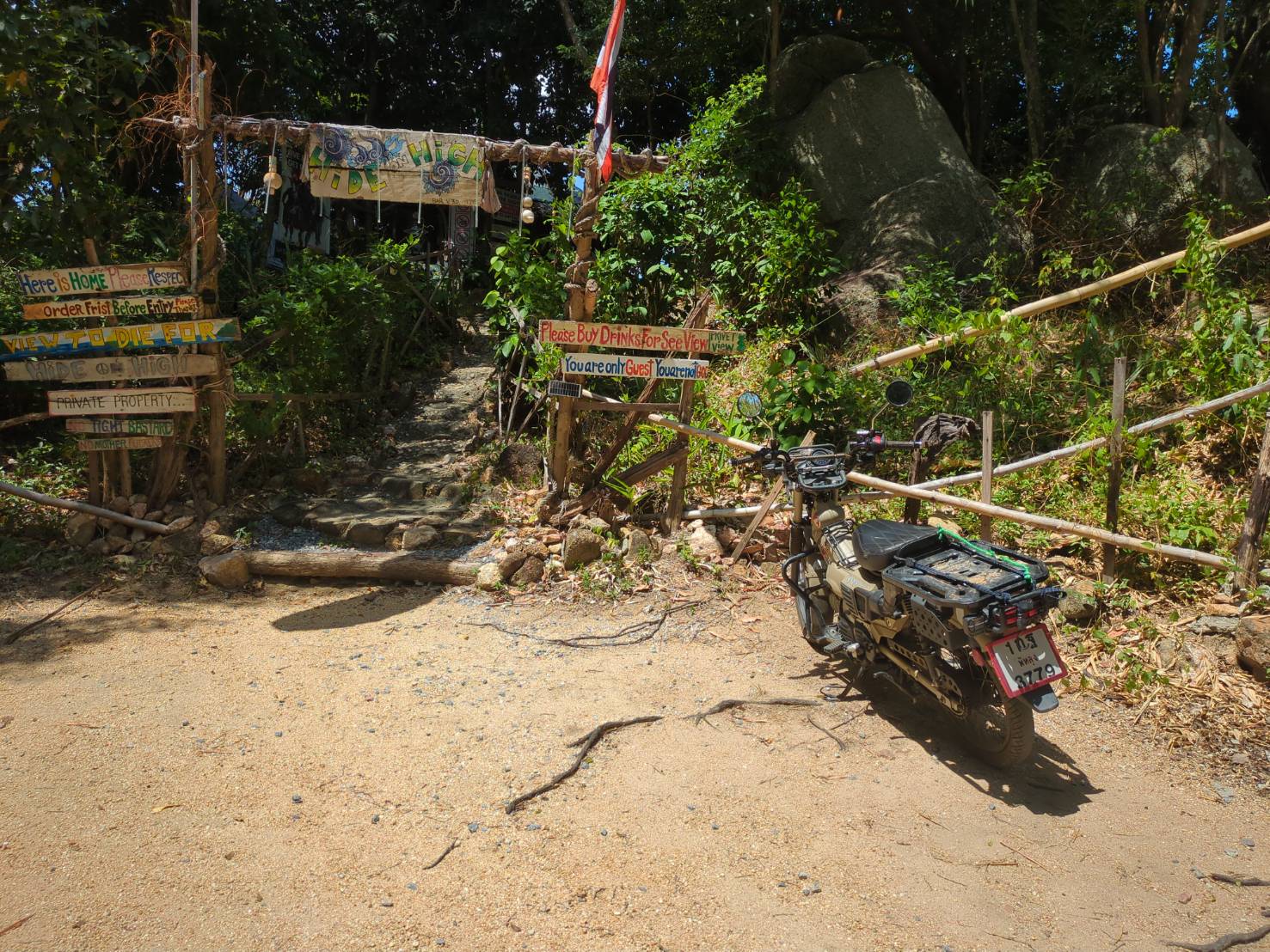 Hide on High bar entrance with signs