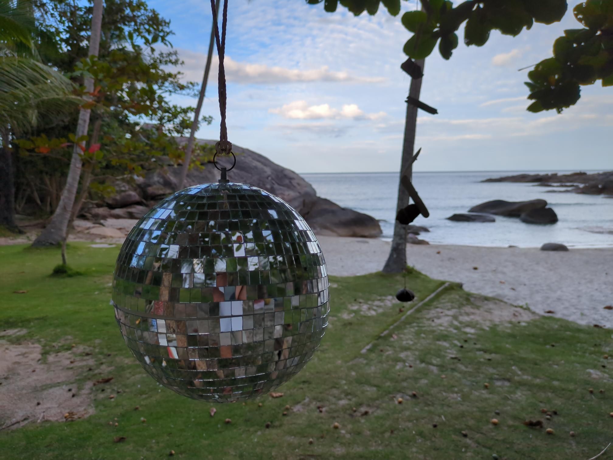 Disco ball with beach backdrop